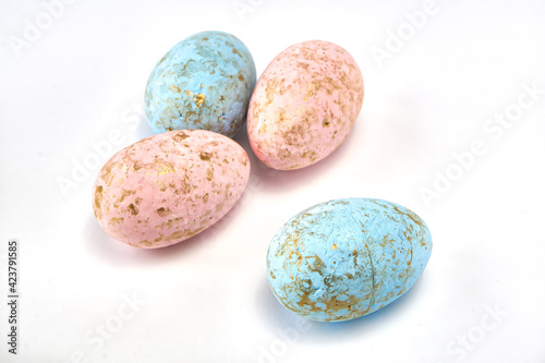Painted Easter eggs light background.