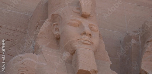 The Abu Simbel temples are two massive rock-cut temples at Abu Simbel, a village in Aswan Governorate, Upper Egypt, near the border with Sudan. They are situated on the western bank of Lake Nasser
