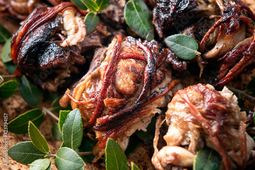 Trattalia, interiora di agnello arrostite allo spiedo, cucina della tradizione agro-pastorale sarda  photo