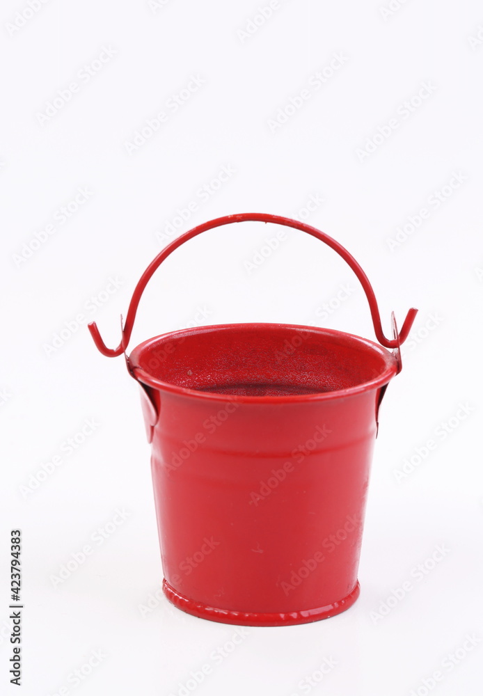 Red metal bucket decorative isolated on white background Red metal bucket decorative isolated on white background
