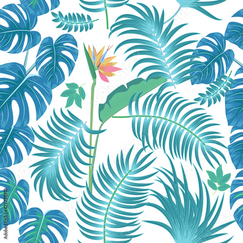 Vector tropical seamless pattern with leaves of palm tree and flowers