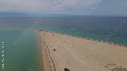 4k steady clip over a peninsula on  the tropical beach of Epanomi, Halkidiki, Greece photo