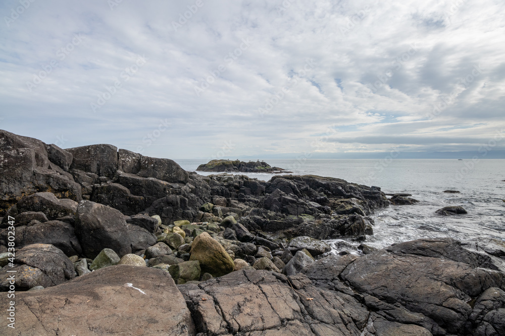 Rocky coast and cloudy sky on Vancouver Island in Canada