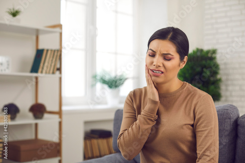 Fotografie, Obraz Woman has a severe toothache