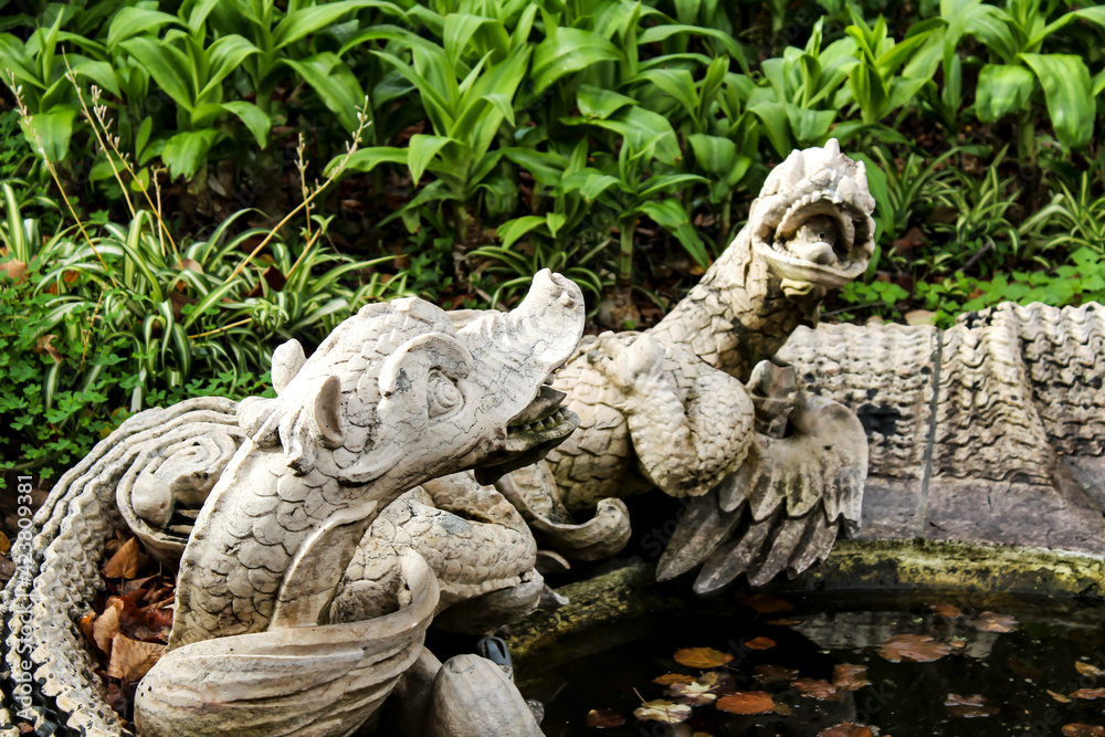 Stone figures in the Botanical garden of Ajuda Stone figures in the Botanical garden of Ajuda