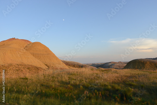 Landscape view of the unusual rock formations at Badlands National Park in South Dakota at sunset