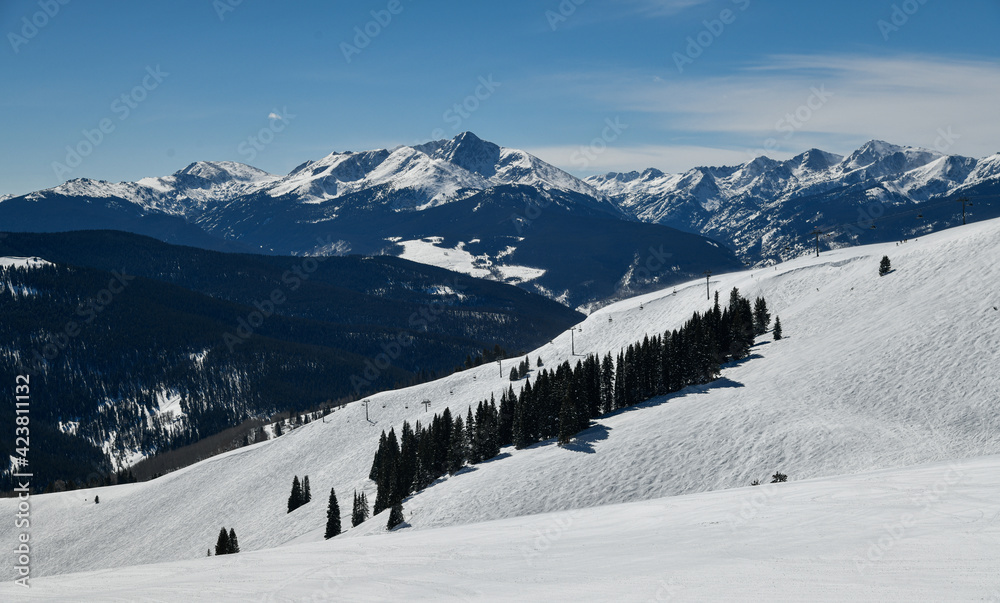 Freeriding zone at off-piste ski slope or at a groomed slope at Vail Ski resort, CO.