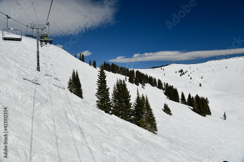 Chair lift at sunny winter day at Vail ski resort, Colorado © FashionStock