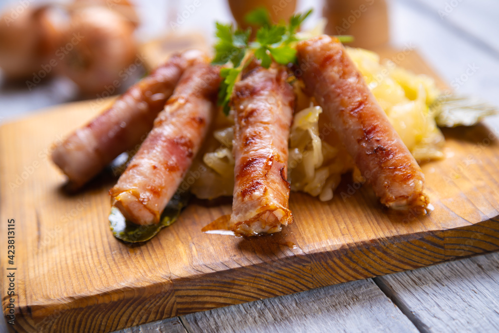 Grilled german sausage links with sauerkraut