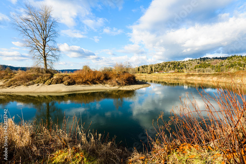 Snoqualmie River flowing in winter through the Snoqualmie Valley in Western Washington State photo