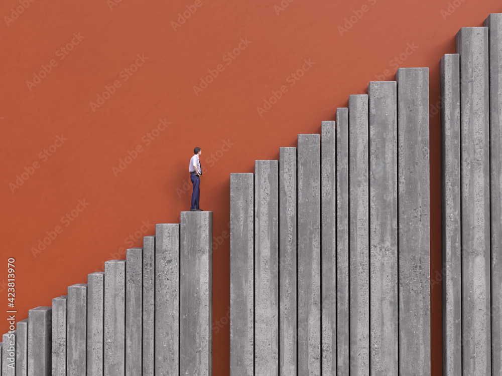 businessman climbs a ruined staircase 