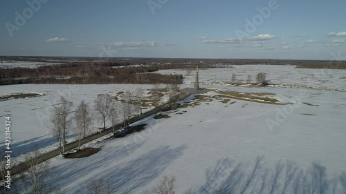 Borodino area and the main monument to Russian soldiers - heroes of the Borodino battle, Borodino, Russia. Aerial. Spring sunny day. Snow in the fields photo