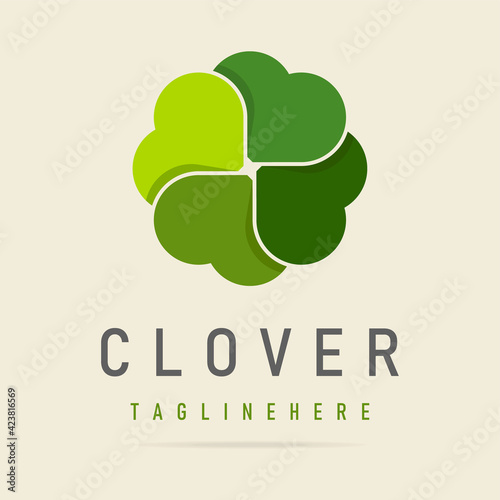 Abstract green clover logo four leaves heart shape,icon irish shamrock luck,sign ecological business company,symbol nature eco.Graphic design template.Simple clean vector logotyp isolated illustration © IrkoValenko