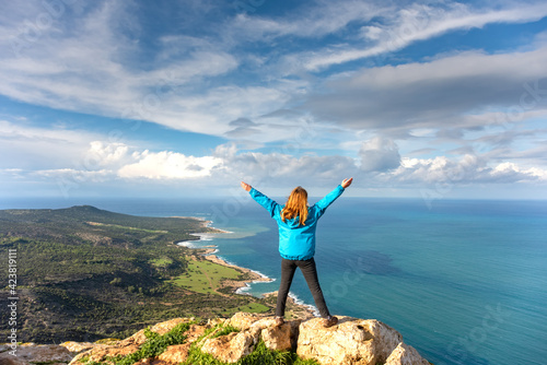 Tourist girl over Landscape of Akamas Peninsula National Park, Cyprus