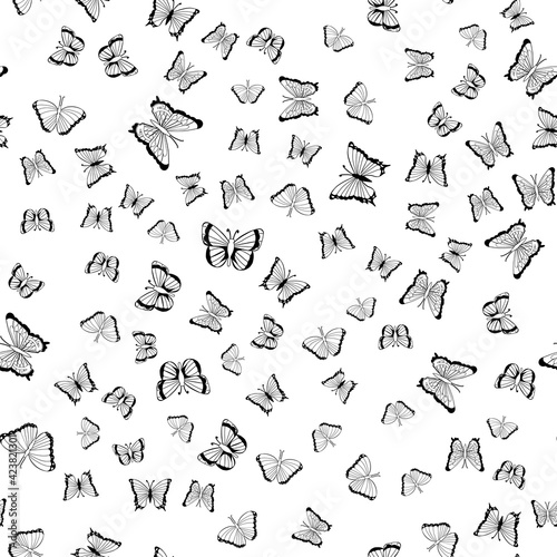 Seamless pattern of black silhouettes of butterflies on white background, illustration.