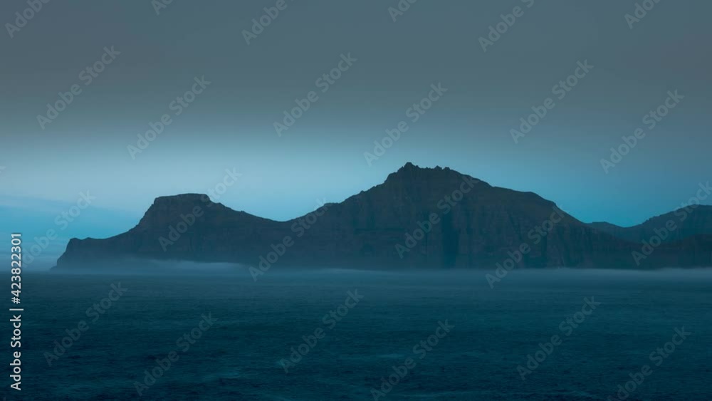 Time lapse with moving fog over ocean in front of island Kalsoy during evening, Faroe Islands
Time lapse with moving fog over ocean in front of island Kalsoy during evening, Faroe Islands