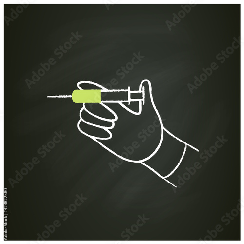 Cosmetic injection chalk icon. Full medicine syringe. Hand keep syringe. Ready to injection. Beauty collection.Vaccination. Cosmetic procedure. Isolated vector illustration on chalkboard