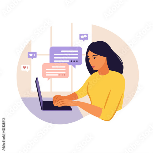 Woman sitting table with laptop and phone. Working on a computer. Freelance, online education or social media concept. Studying concept. Flat style.