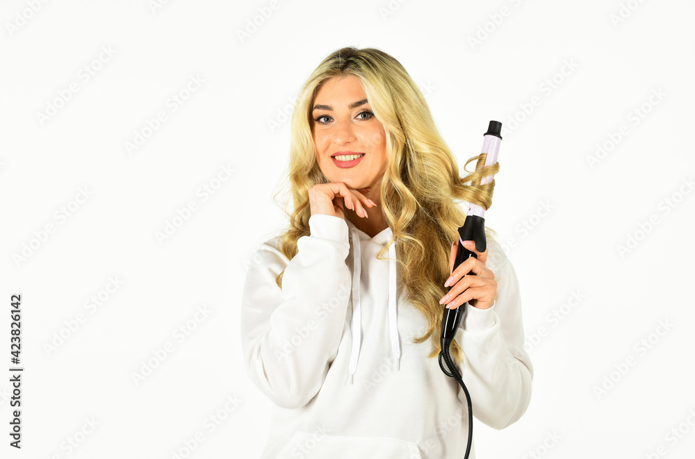 Create beautiful hairstyle with curling iron. Hairdresser tips.Woman with long curly hair use curling iron. Heat setting for hair type. Girl adorable blonde hold curling iron. Gorgeous hairstyle