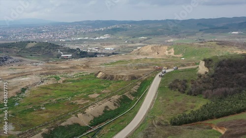 view of the city and city ​​garbage and garbage trucks