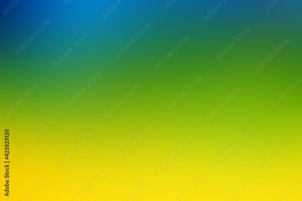 Abstract blurred background of yellow, blue and green colors