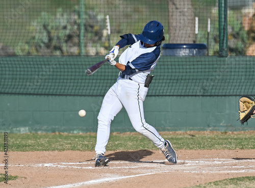 Photography Action photo of high school baseball players making amazing plays during a baseb
