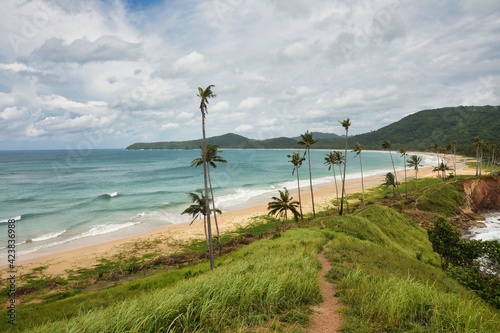 El Nido Palawan in the Philippines  hidden beautiful beache at windy cloudy day  waves ocean  uneso nature resort