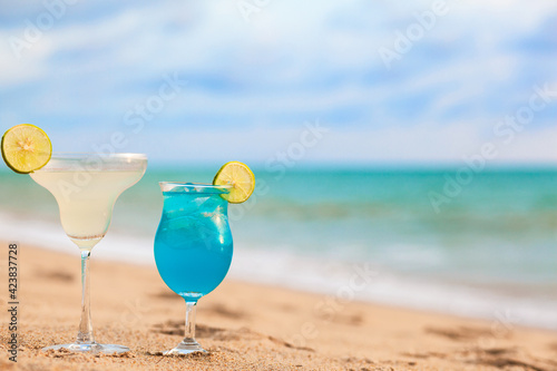 exotic coctails over beach background. Thailand