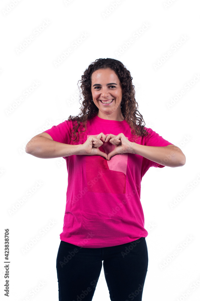 Smiling positive young woman with pink shirt Smiling positive young woman with pink shirt