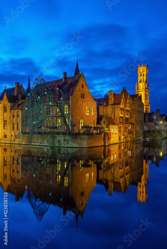 Vertical canal in Bruges during blue hour, West Flanders, Belgium.