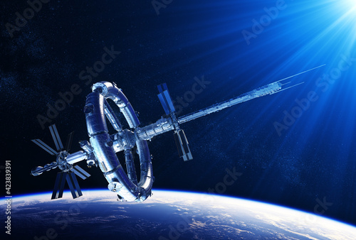 Fototapeta Naklejka Na Ścianę i Meble -  Futuristic Space Station In The Rays Of Blue Light