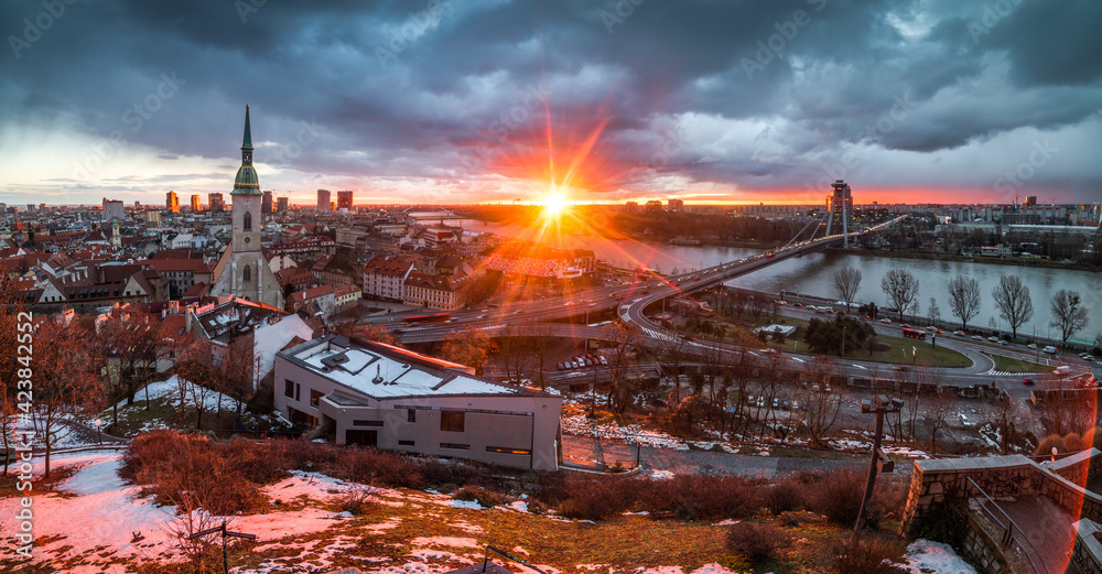 Cityscape of Bratislava, Slovakia with St. Martin's Cathedral and Danube River with New Bridge at Sunrise