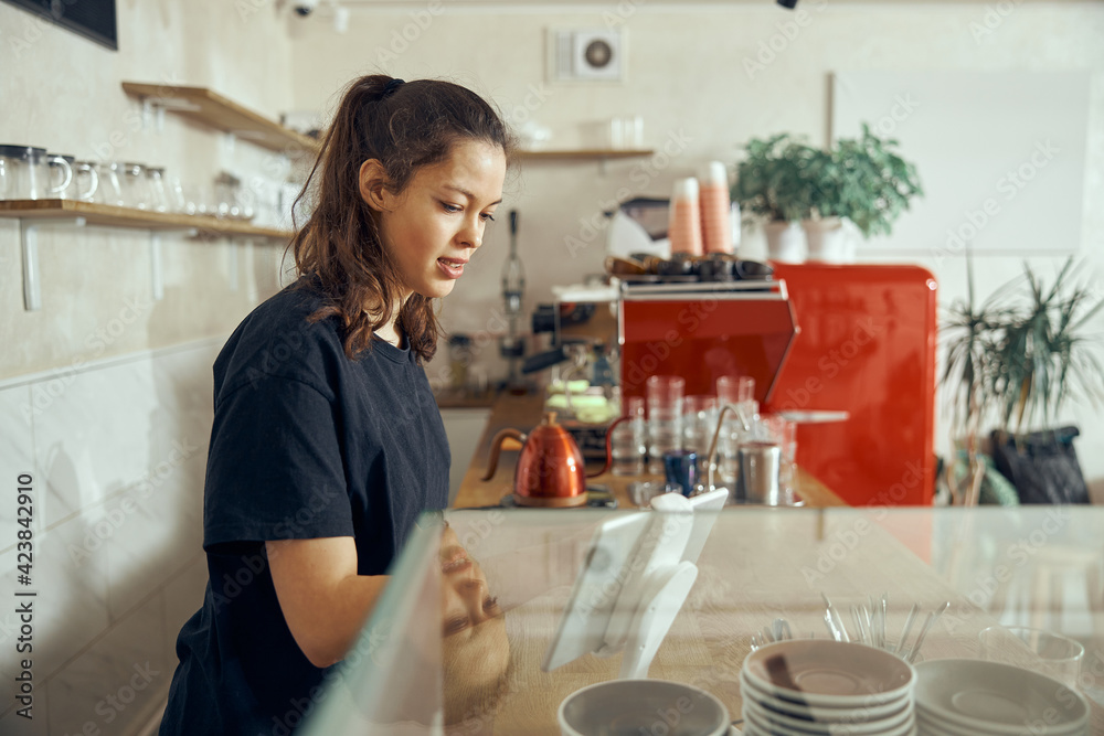 Barista taking order from customer cafe. Concept of cafe and coffee shop small business Barista taking order from customer cafe. Concept of cafe and coffee shop small business