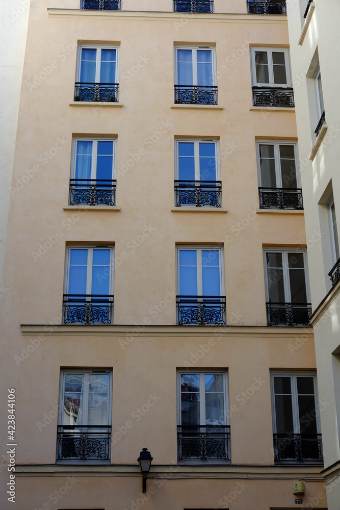 Parisians facades during a sunny day. march 2021, Paris France.