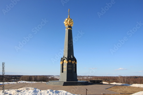 Borodino area and the main monument to Russian soldiers - heroes of the Borodino battle, Borodino, Russia. Aerial. Spring sunny day. Snow in the fields photo