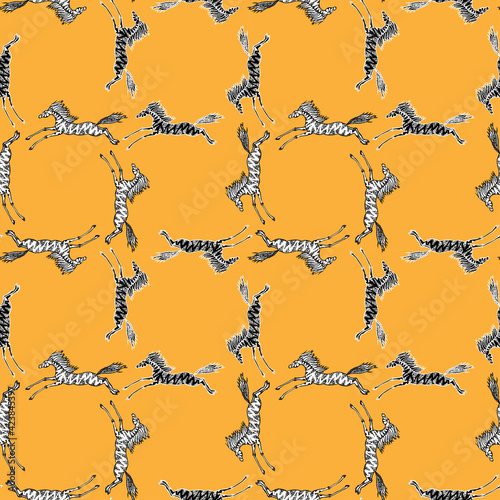 Seamless pattern of drawn black and white galloping horses