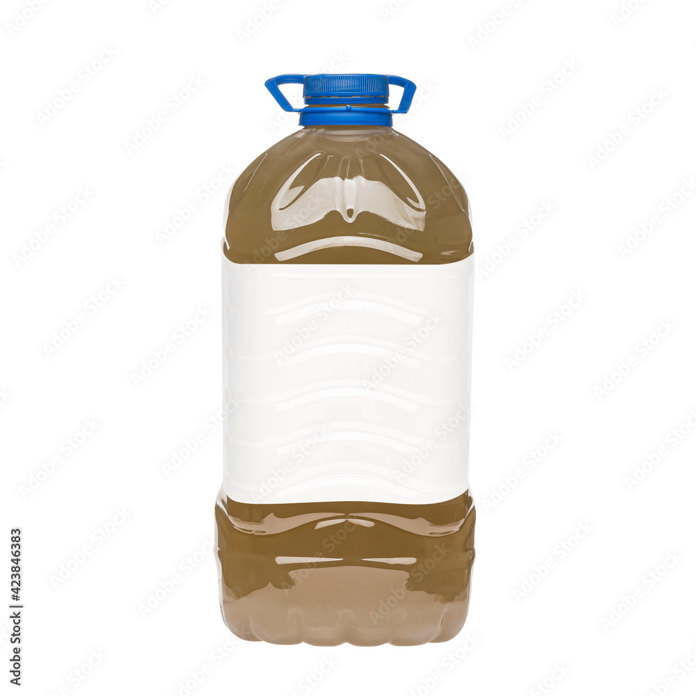 Light brown liquid in a large transparent plastic bottle with blue cap and carrying handle Light brown liquid in a large transparent plastic bottle with blue cap and carrying handle