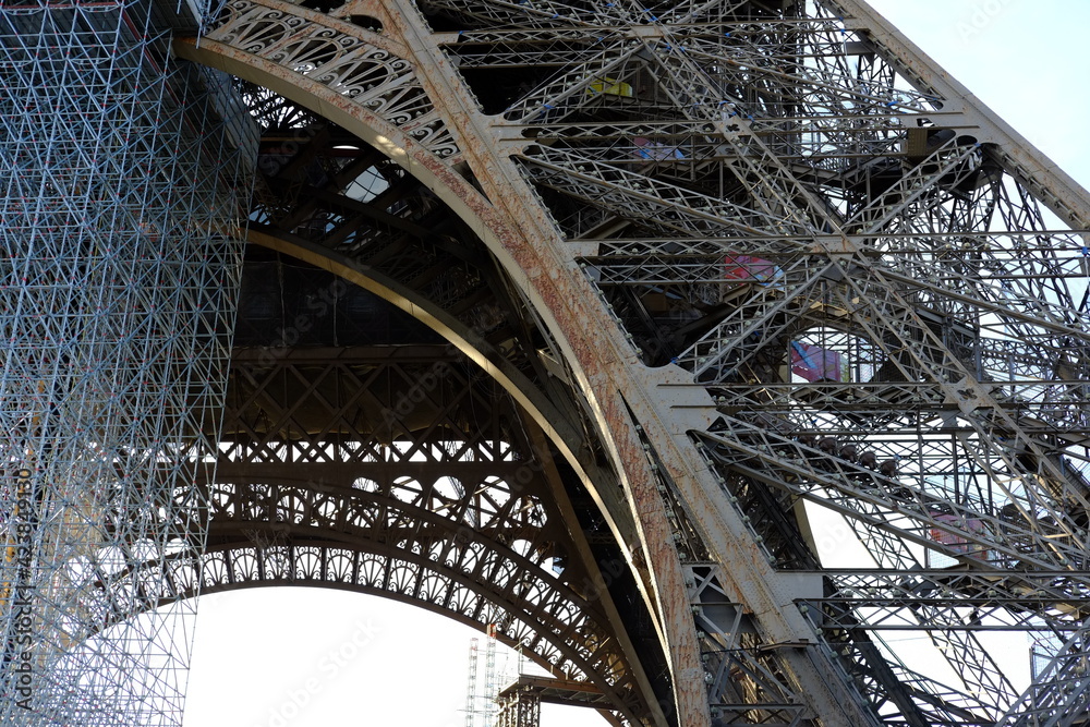 The arch of the Eiffel during painting operations which take place every 7 years. Paris, France, the 29th march 2021.