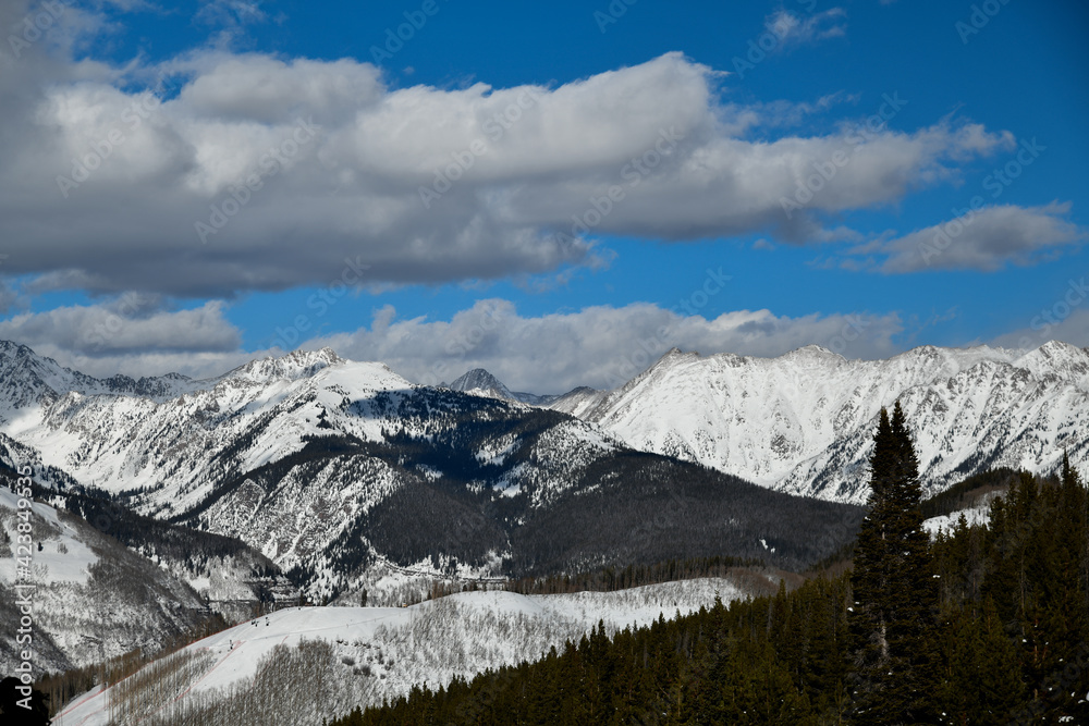 White clouds over Vail ski resort mountains, Colorado USA