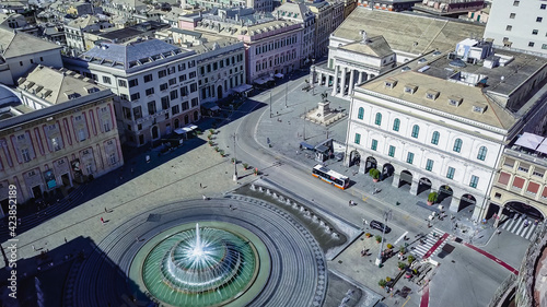 Aerial panoramic drone view of Fountain in main square of city Piazza De Ferrari in Genoa,Italy. photo