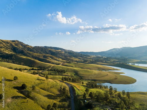 Scenic view over country paddocks to Lake St Clair in Hunter Valley