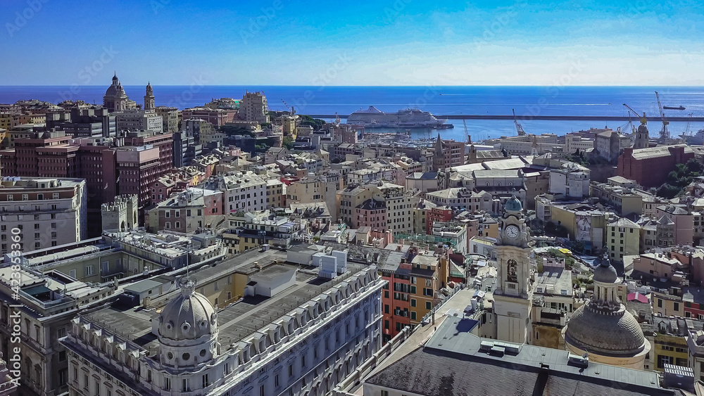 Aerial panoramic view of buildings,streets surrounding Port of Genoa.Important hub of maritime trade