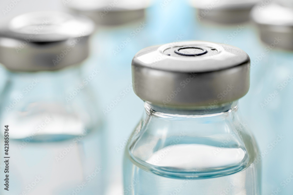 Close-up of vial with Covid-19 vaccine Close-up of vial with Covid-19 vaccine