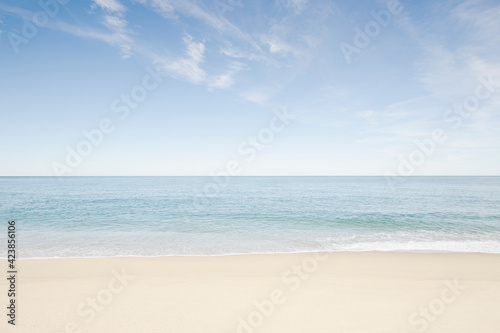 Sandy beach with ocean photo