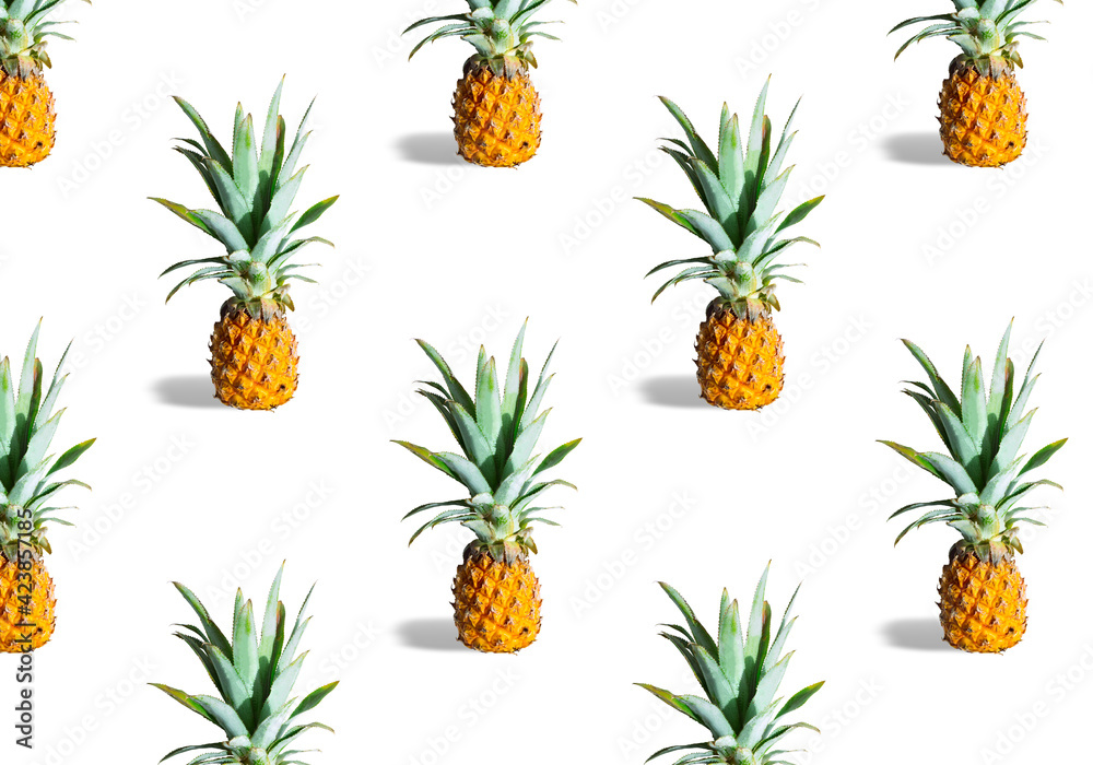 Seamless pattern of ripe pineapples isolated on white background. Exotic tropical fruit Seamless pattern of ripe pineapples isolated on white background. Exotic tropical fruit