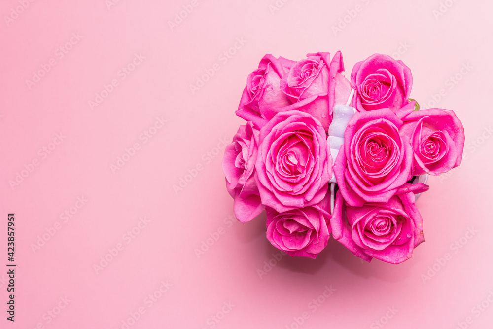 Bouquet of fresh pink roses in a bucket Bouquet of fresh pink roses in a bucket