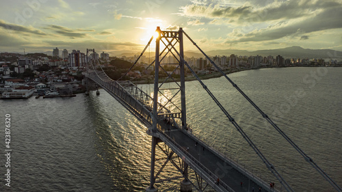 Por do sol na ponte Hercilio Luz em Florianopolis - Santa Catarina photo