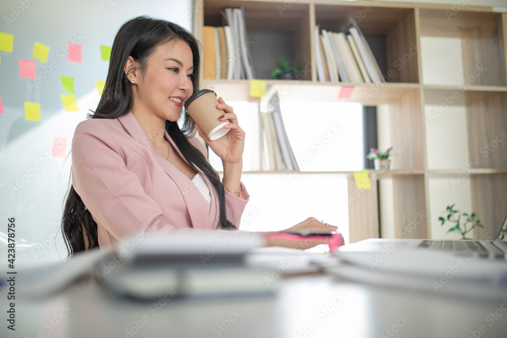 Portrait of Asian woman using computer laptop innovative ideas, in video call conference meetings and work from home. Portrait of Asian woman using computer laptop innovative ideas, in video call conference meetings and work from home.