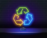 Multicolored neon light recycle symbol sign. Recycle neon light icon. Environment protection. Recycle arrows sign. Vector isolated illustration