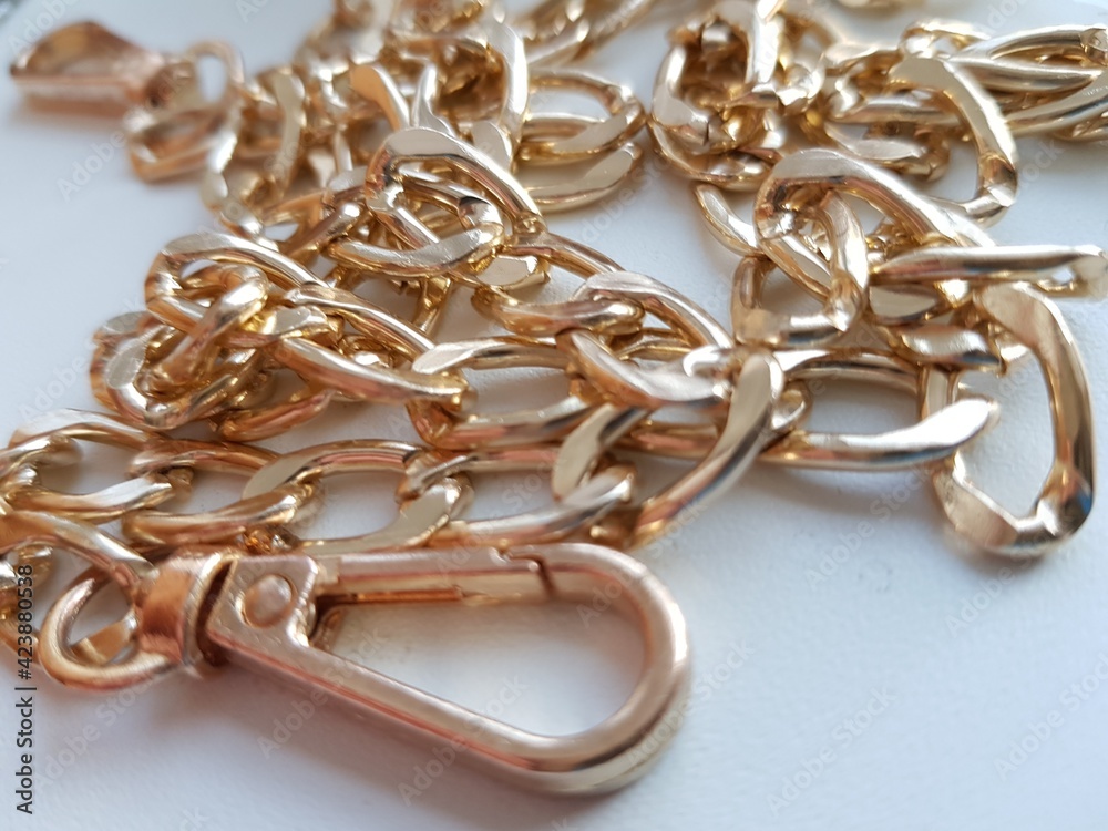 Gold chain on the table Gold chain on the table